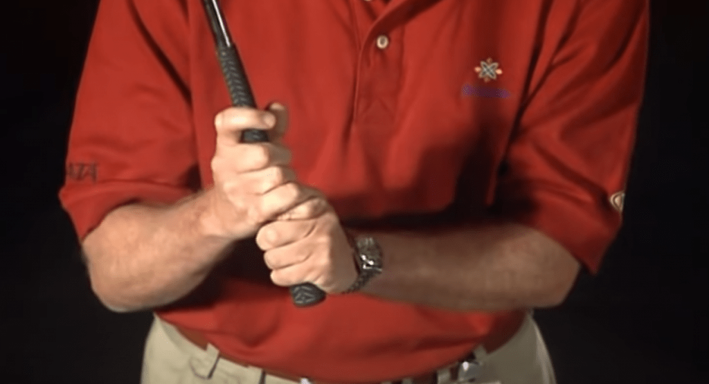 Interlocking grip to set up the golf swing